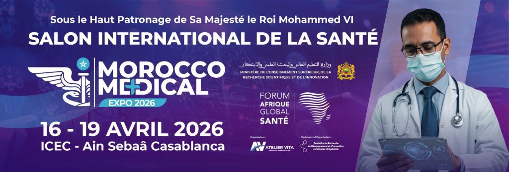 Affiche promotionnelle du Salon International de la Santé – Morocco Medical Expo 2026, organisé sous le Haut Patronage de Sa Majesté le Roi Mohammed VI. L’événement se tient du 16 au 19 avril 2026 à l’ICEC – Aïn Sebaâ, Casablanca. Le visuel présente un design moderne en tons violets et bleus, avec un logo médical stylisé et la mention du Forum Afrique Global Santé. À droite, un médecin portant un masque et une blouse consulte une tablette numérique affichant des données médicales futuristes, symbolisant l’innovation en santé. Des logos institutionnels et partenaires apparaissent en bas de l’affiche.