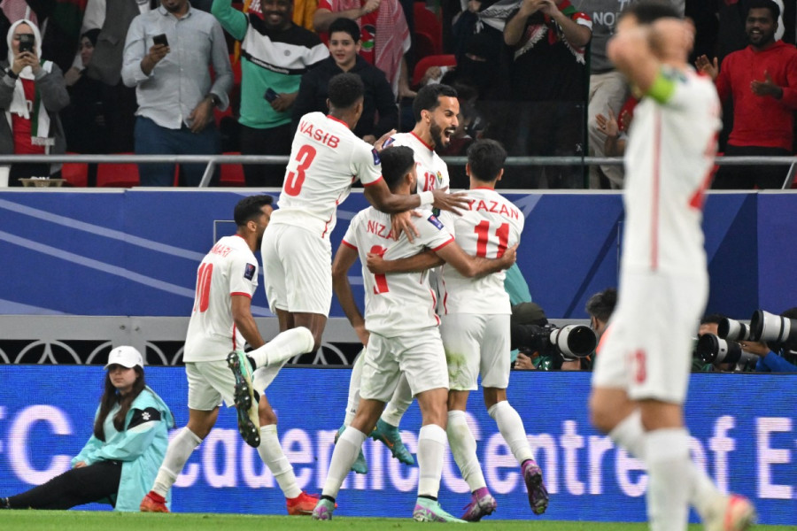 jordans forward 11 yazan al naimat celebrates with teammates after scoring a goal during the qatar 2023 afc asian cup semi final football match between jordan and south korea 1707237972